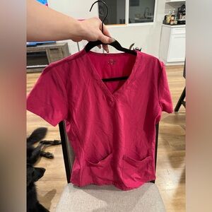 Bright pink scrub top